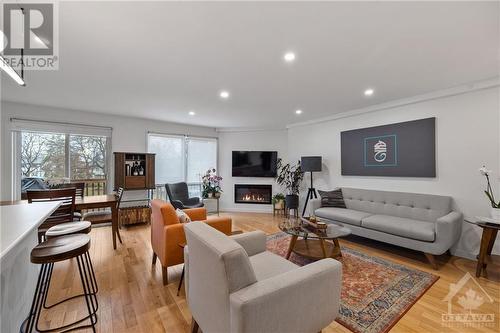 35C Stonehaven Drive, Ottawa, ON - Indoor Photo Showing Living Room With Fireplace