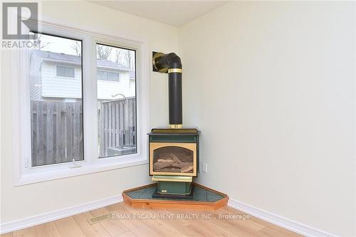 2 - 2222 Upper Middle Road, Burlington, ON - Indoor Photo Showing Other Room With Fireplace