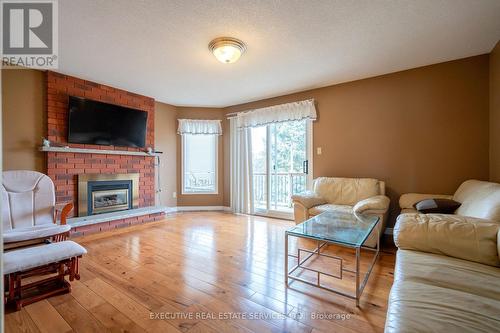 6 Fernbrook Cres, Brampton, ON - Indoor Photo Showing Living Room With Fireplace