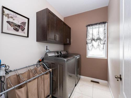 Salle de lavage - 4955 Rue Cherrier, Laval (Chomedey), QC - Indoor Photo Showing Laundry Room
