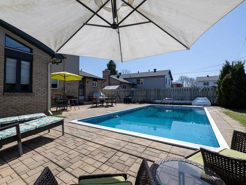 Piscine - 86 Rue Stormont, Kirkland, QC - Outdoor With In Ground Pool With Exterior