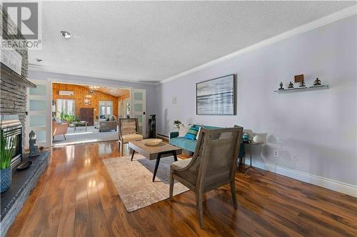 17 Harris Crescent, Beachburg, ON - Indoor Photo Showing Living Room With Fireplace