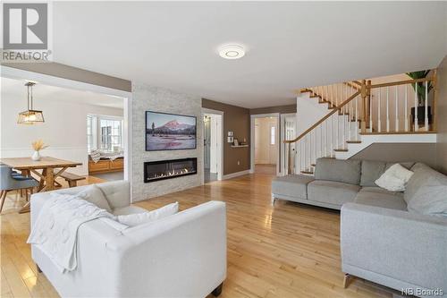 52 Deerwood Drive, Hanwell, NB - Indoor Photo Showing Living Room With Fireplace