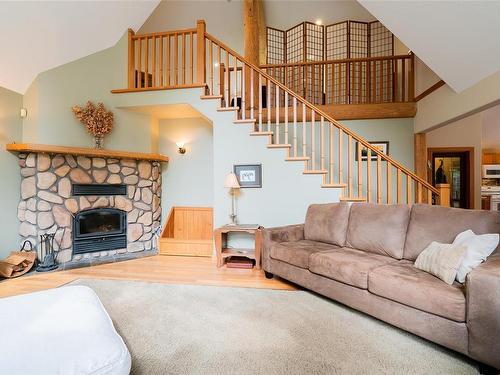 1029 Englishman River Rd, Errington, BC - Indoor Photo Showing Living Room With Fireplace