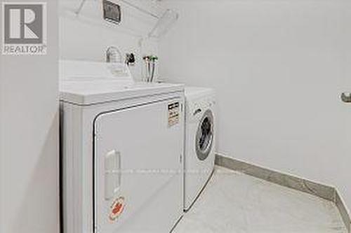 807 - 28 Rosebank Drive, Toronto, ON - Indoor Photo Showing Laundry Room