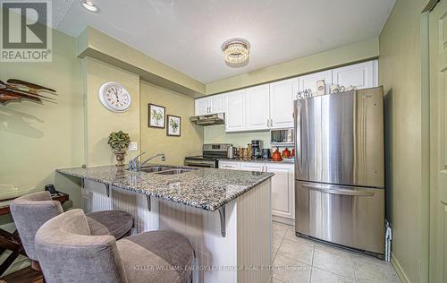 102 - 61 Clarington Boulevard, Clarington, ON - Indoor Photo Showing Kitchen With Double Sink