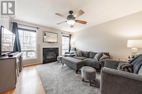 657 Bennett Blvd, Milton, ON - Indoor Photo Showing Living Room With Fireplace