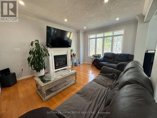 33 Cumming Dr, Barrie, ON - Indoor Photo Showing Living Room With Fireplace