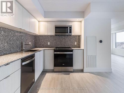 604 - 10 Eva Road, Toronto, ON - Indoor Photo Showing Kitchen With Upgraded Kitchen