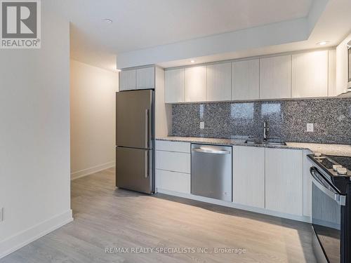 604 - 10 Eva Road, Toronto, ON - Indoor Photo Showing Kitchen With Upgraded Kitchen