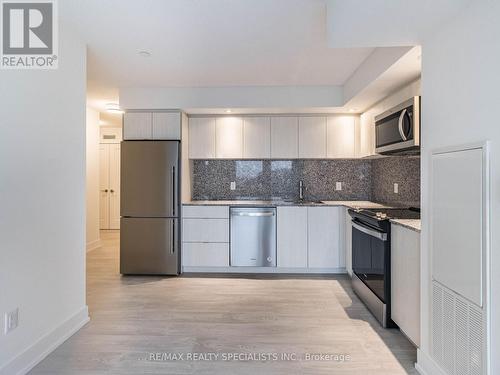 604 - 10 Eva Road, Toronto, ON - Indoor Photo Showing Kitchen With Upgraded Kitchen