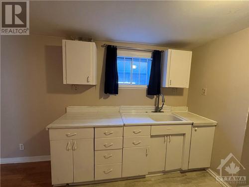 basement- kitchen - 1159 Maitland Avenue, Ottawa, ON - Indoor Photo Showing Laundry Room