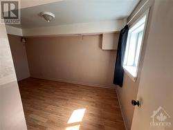 basement- bedroom with large window - 