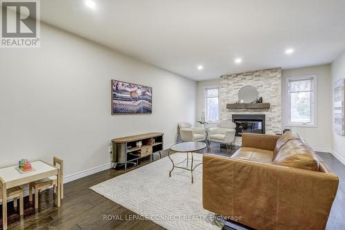 16 Fisher St, Brantford, ON - Indoor Photo Showing Living Room With Fireplace