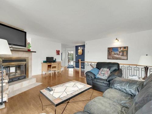 Salon - 153 Mtée Victor-Nymark, Saint-Sauveur, QC - Indoor Photo Showing Living Room With Fireplace