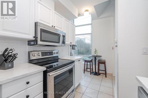 #104 -1 Elm Dr W, Mississauga, ON - Indoor Photo Showing Kitchen With Stainless Steel Kitchen