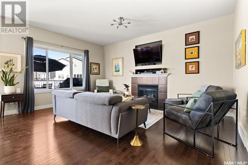 4546 Padwick Crescent, Regina, SK - Indoor Photo Showing Living Room With Fireplace