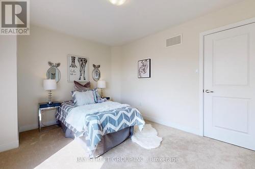 #122 -100 Donald Fleming Way, Whitby, ON - Indoor Photo Showing Bedroom