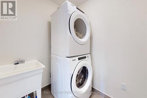 #122 -100 Donald Fleming Way, Whitby, ON - Indoor Photo Showing Laundry Room