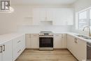 138 Taube Avenue, Saskatoon, SK  - Indoor Photo Showing Kitchen With Double Sink 