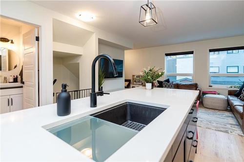 204 388 Pipeline Road, Winnipeg, MB - Indoor Photo Showing Kitchen With Double Sink