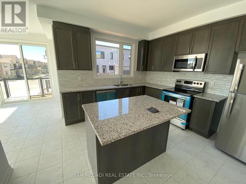 #63 -85 Grovewood Common, Oakville, ON - Indoor Photo Showing Kitchen With Stainless Steel Kitchen With Upgraded Kitchen