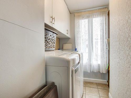 Salle de lavage - 318-3950 Boul. Sir-Wilfrid-Laurier, Longueuil (Saint-Hubert), QC - Indoor Photo Showing Laundry Room