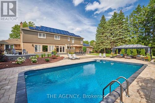 587 Manorwood Crt, Waterloo, ON - Outdoor With In Ground Pool With Deck Patio Veranda With Backyard