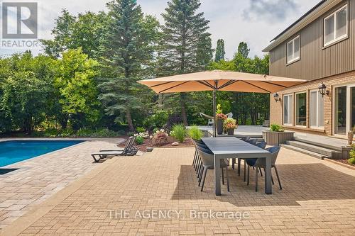 587 Manorwood Crt, Waterloo, ON - Outdoor With In Ground Pool With Deck Patio Veranda
