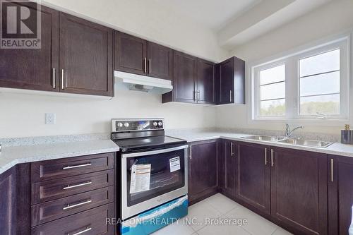 148 Hawkins St, Georgina, ON - Indoor Photo Showing Kitchen With Double Sink