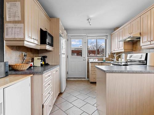 Kitchen - 9110  - 9112 Rue De Louisiane, Montréal (Saint-Léonard), QC - Indoor Photo Showing Kitchen With Double Sink