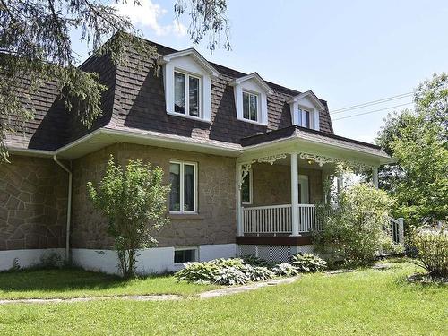 FaÃ§ade - 582 Boul. St-Francois, Lac-Des-Écorces, QC - Outdoor With Deck Patio Veranda