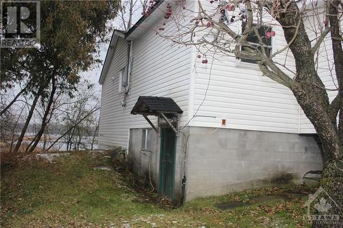 this entry on the back is to the crawl space. - 4220 Hwy 511 Highway, Lanark, ON - Outdoor