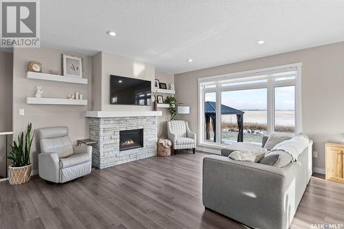 45 Wakonda Ridge, Wakaw Lake, SK - Indoor Photo Showing Living Room With Fireplace