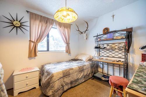 59 Cassiar Drive, Elkford, BC - Indoor Photo Showing Bedroom