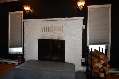 159 3Rd Avenue, Binscarth, MB - Indoor Photo Showing Other Room With Fireplace