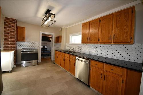 159 3Rd Avenue, Binscarth, MB - Indoor Photo Showing Kitchen With Double Sink