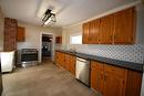 159 3Rd Avenue, Binscarth, MB  - Indoor Photo Showing Kitchen With Double Sink 