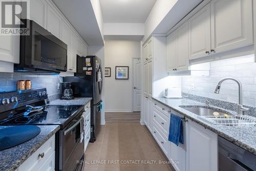 #101 -45 Ferndale Dr S, Barrie, ON - Indoor Photo Showing Kitchen With Double Sink With Upgraded Kitchen