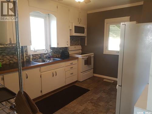 208 Railway Avenue, Stoughton, SK - Indoor Photo Showing Kitchen With Double Sink
