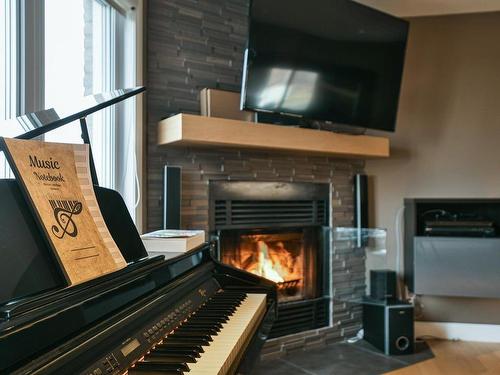 Salon - 97 Boul. Jérobelle, Saint-Jérôme, QC - Indoor Photo Showing Dining Room With Fireplace