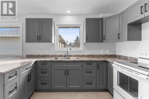 211 3Rd Avenue W, Watrous, SK - Indoor Photo Showing Kitchen With Double Sink