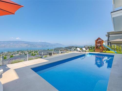 5590 Trestle Ridge Court, Kelowna, BC - Outdoor With In Ground Pool