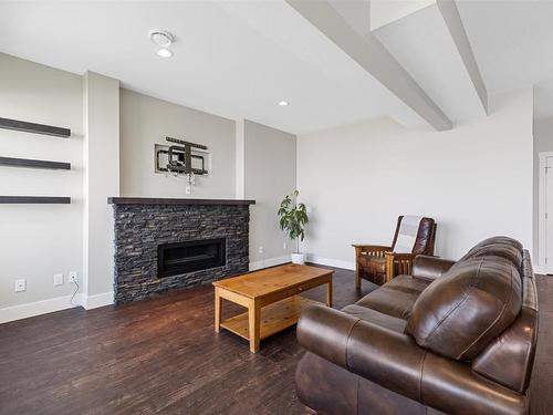 5590 Trestle Ridge Court, Kelowna, BC - Indoor Photo Showing Living Room With Fireplace
