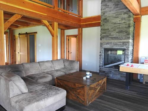 1144 Tappen Valley Road, Tappen, BC - Indoor Photo Showing Living Room With Fireplace