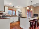 96-9845 Eastside Road, Vernon, BC  - Indoor Photo Showing Kitchen With Double Sink 