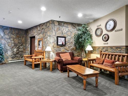 504-7470 Porcupine Road, Big White, BC - Indoor With Fireplace