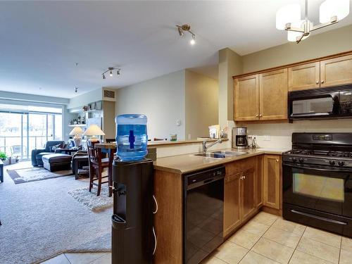 207-2532 Shoreline Drive, Lake Country, BC - Indoor Photo Showing Kitchen With Double Sink