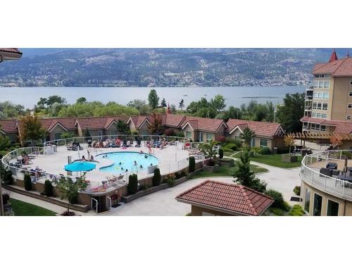 542-1088 Sunset Drive, Kelowna, BC - Outdoor With Body Of Water With In Ground Pool