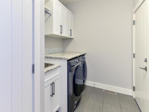 1674 Travertine Drive, Lake Country, BC - Indoor Photo Showing Laundry Room